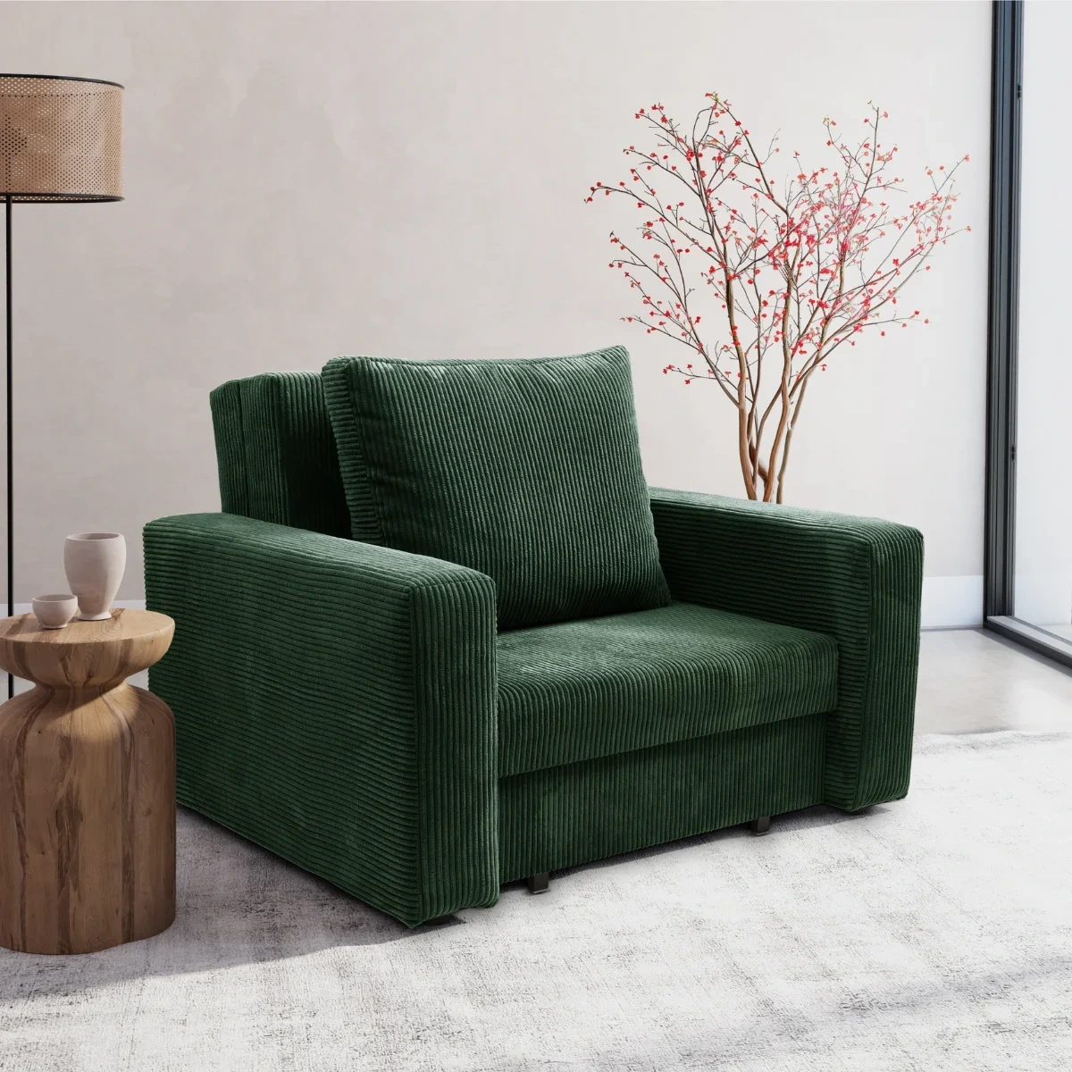 Sofa do salonu w kolorze butelkowej zielenii